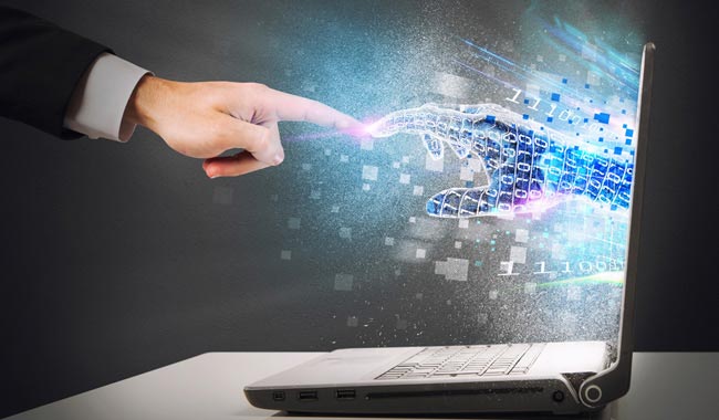 Hand touching a digital hand emerging from a laptop.