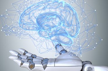 Robot hand holding a glowing brain connected to a network.