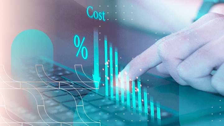 Hand touching a laptop with a cost reduction chart.