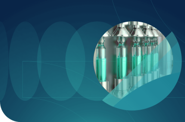 Pharmaceutical production process showing vials being filled with liquid.