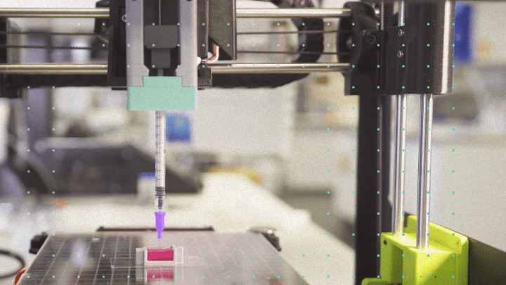 3D printer producing biological tissue in a laboratory.