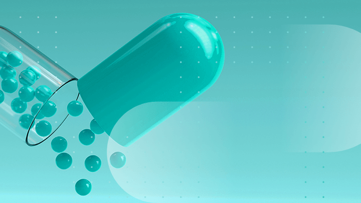 Opening blue capsule with small beads inside.
