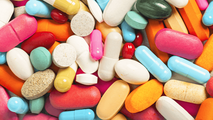 Various colorful pills and capsules.