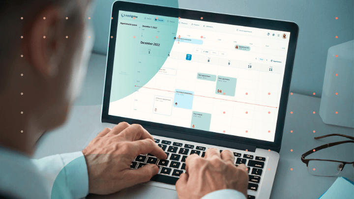 Man using calendar software on a laptop.