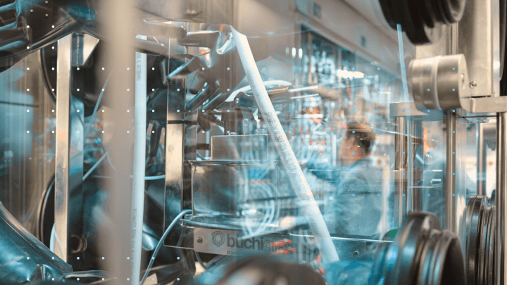 Scientist working in a laboratory with Buchi equipment.