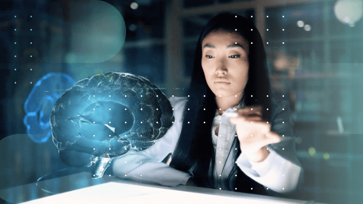 Female researcher in a laboratory interacting with a hologram of a brain.