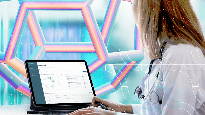 Doctor using a tablet to review medical data and charts.