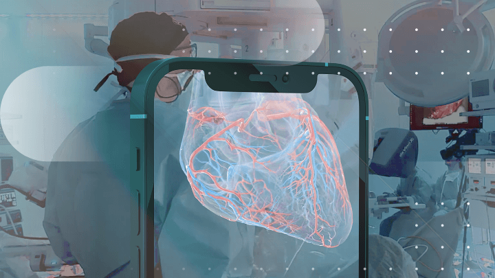 Surgeons in an operating room with a hologram of a human heart displayed on a phone.