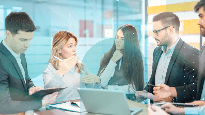 Business environment: people discussing business ideas in a conference room.