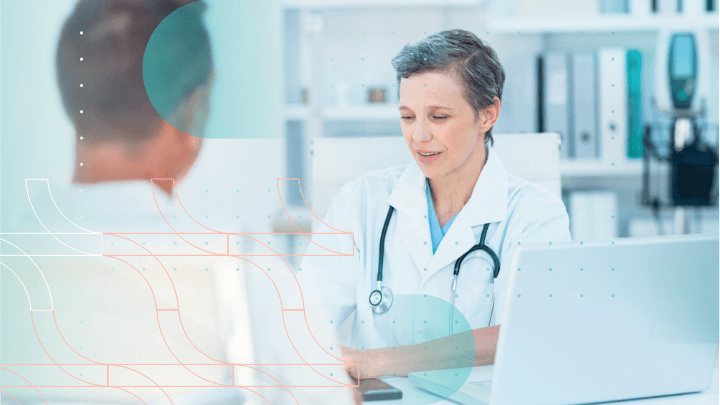 Female doctor talking to a patient in her office.