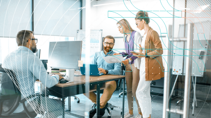 Team discussing a project in a bright, modern office.