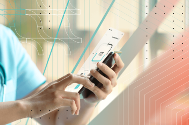 Hands of a healthcare professional holding a phone with a health app.
