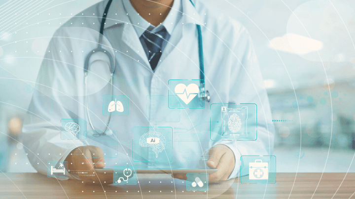 Doctor holding a tablet with digital holograms of organs and medical data.