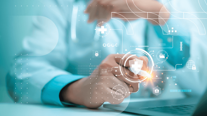 Doctor working on a laptop, displaying a data security icon.