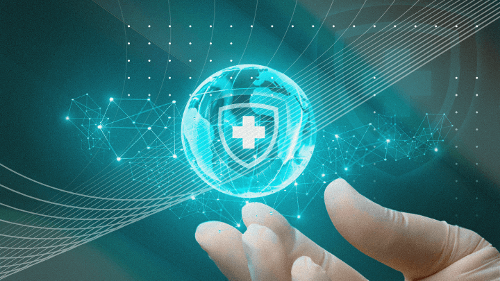 Hand holding a digital globe with a protective shield, symbolizing healthcare security.