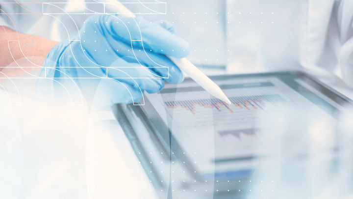 Gloved hand using a stylus on a tablet to analyze data.