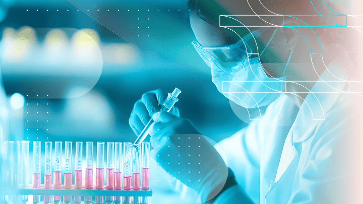 Scientist in a laboratory working with test tubes using a pipette.