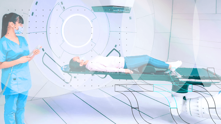 Medical professional preparing a patient for a scanner or radiotherapy.