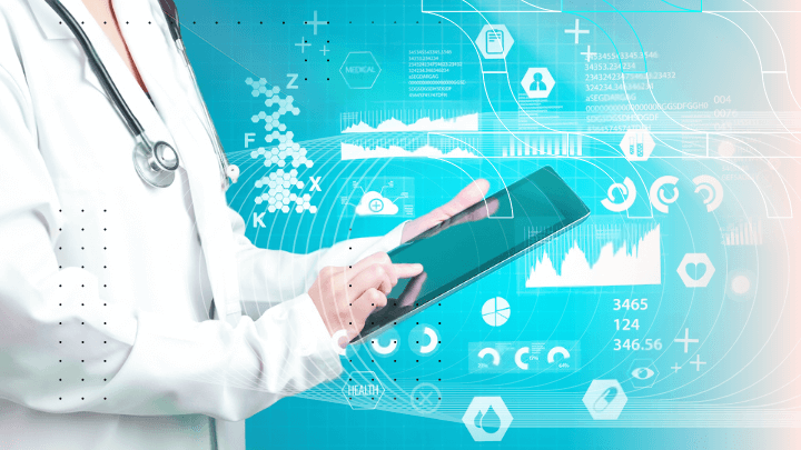 Doctor using a tablet to review medical data and analyses.