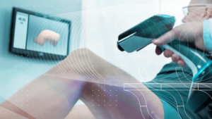 Doctor using a 3D scanner to examine a knee.