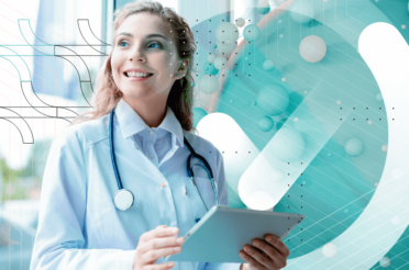 Smiling female doctor holding a tablet, looking to the side.