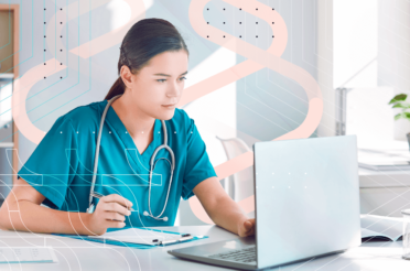 Nurse working on a laptop in an office, analyzing medical data.