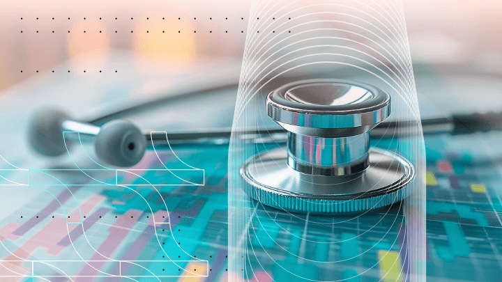 Stethoscope placed on a screen with medical data.