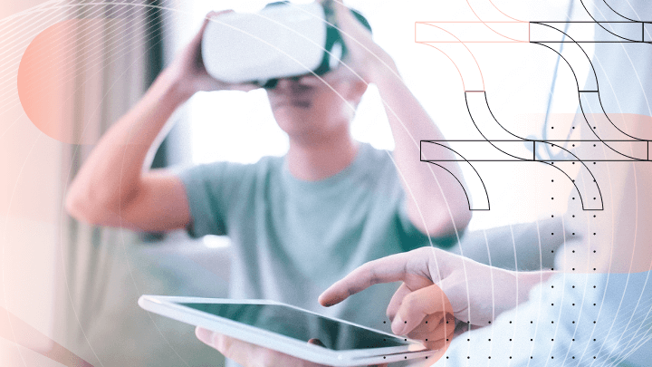 Patient using VR headset while a medical professional uses a tablet.