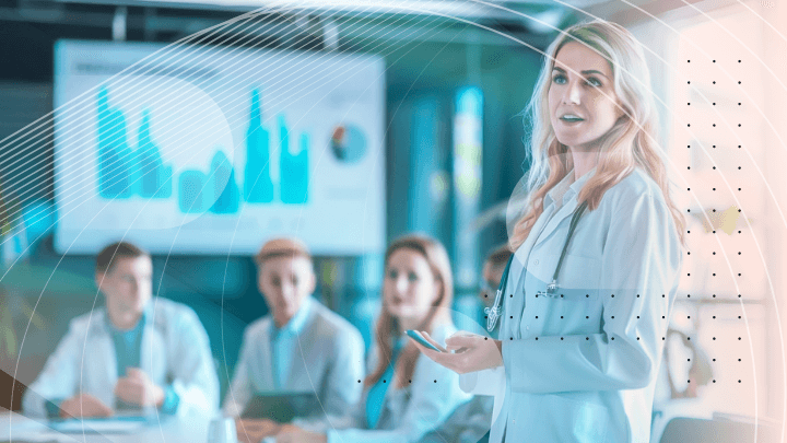 Female doctor presenting data to colleagues during a meeting.