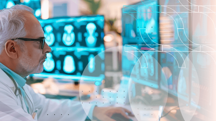 Elderly doctor reviewing X-rays and other medical data on monitors.