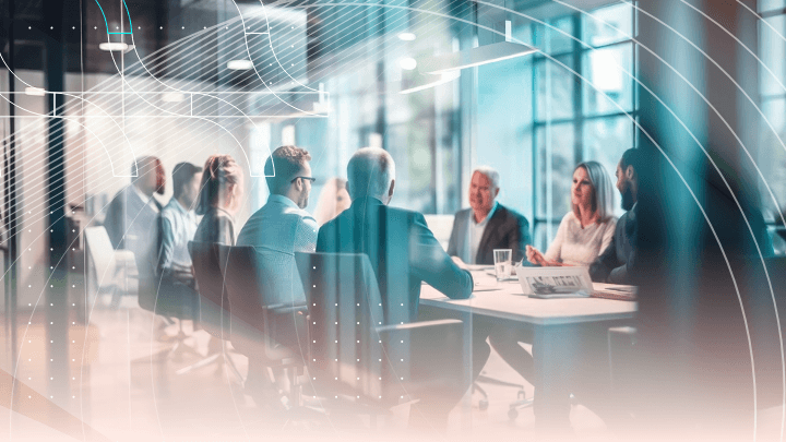 Business team in a conference room meeting, discussing a project.