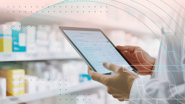 Pharmacist using a tablet to manage pharmacy inventory.