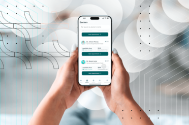 Hands holding a smartphone with a medical appointment scheduling app.