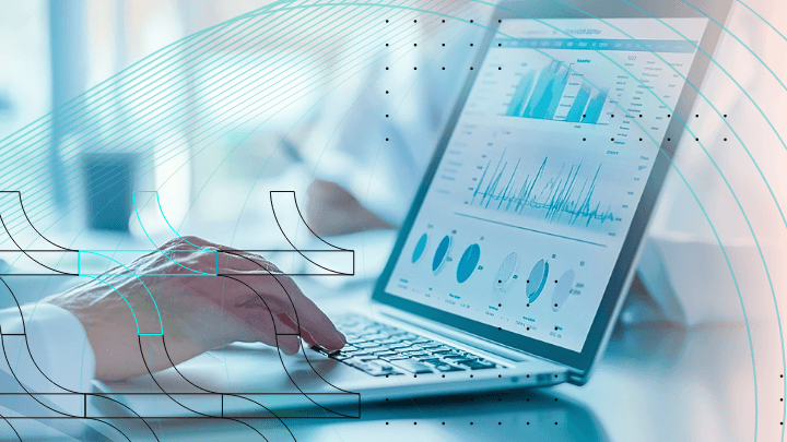 Doctor using a laptop with charts and graphs, analyzing data.