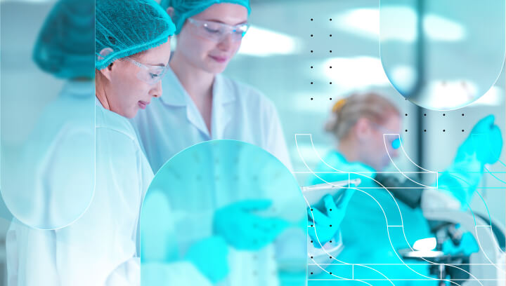 Scientists discussing data, demonstrating the steps of implementing Digital Validation Technology (DVT) in a GxP environment.