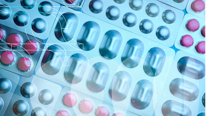 A large number of blister packs with capsules and pills.